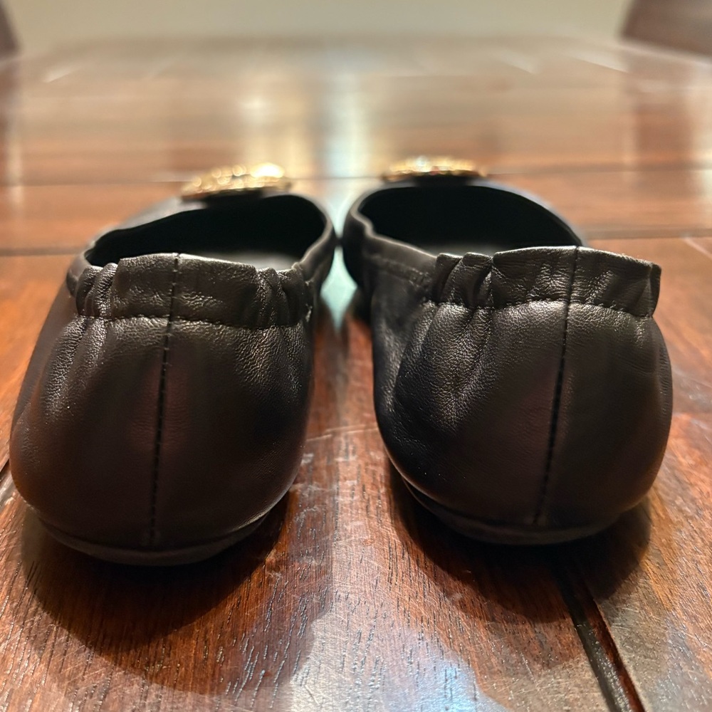 Tory Burch Black Flats with Gold Emblem - Picture 6 of 9